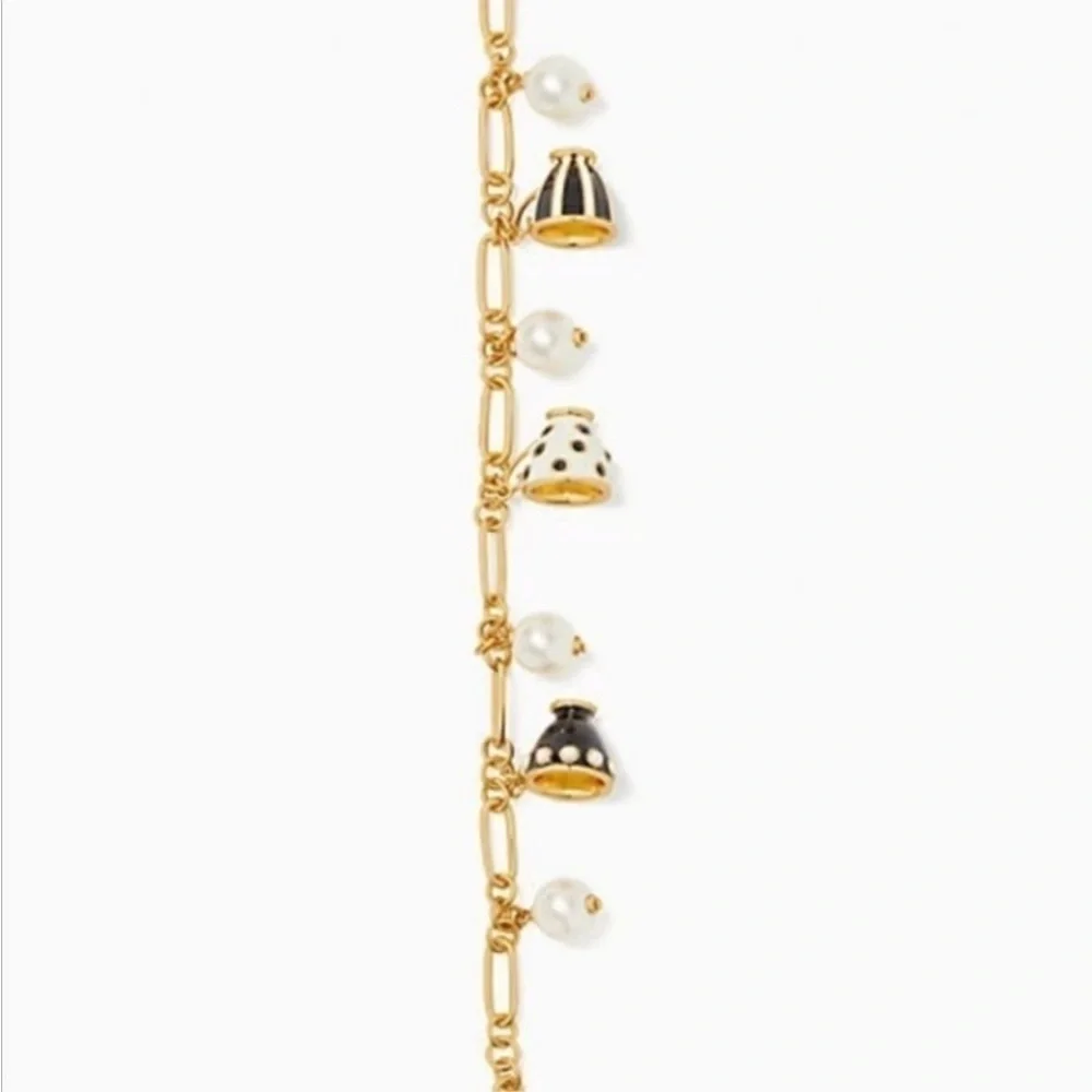 Kate Spade alice in wonderland teacup charm bracelet